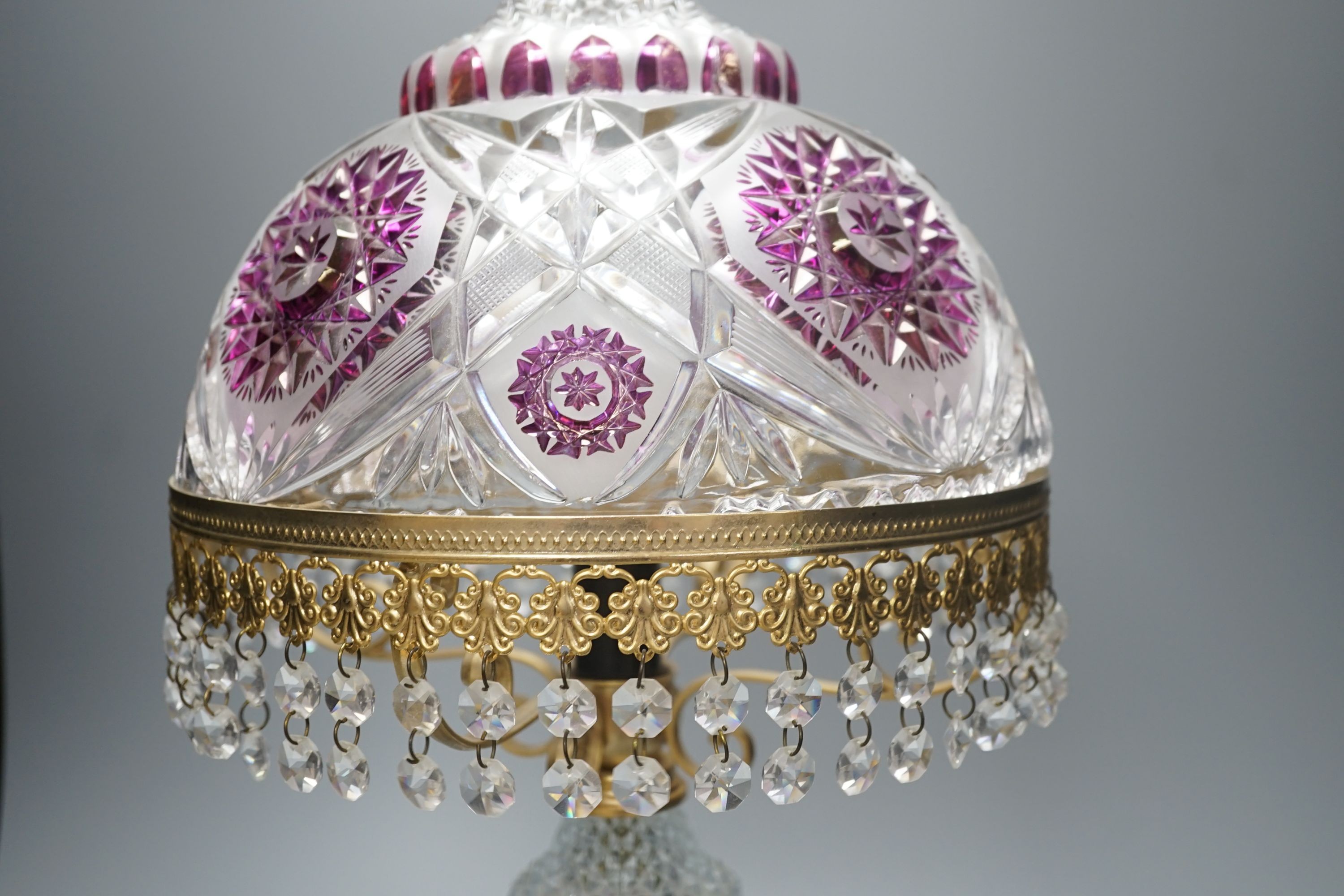 An Italian cut clear, frosted and amethyst glass table lamp with gilt metal mounts-57 cms high.